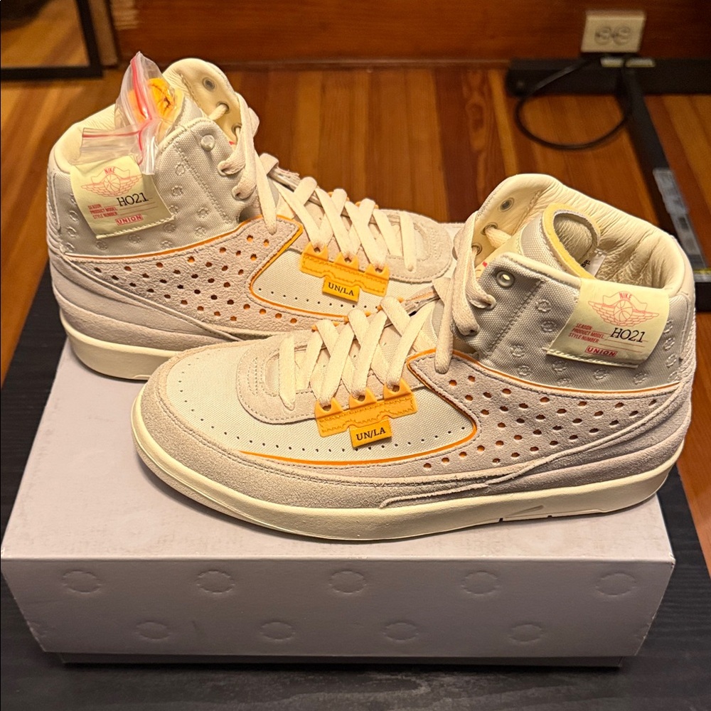Jordan 2 Retro SP Athletic Shoes in Cream and Orange